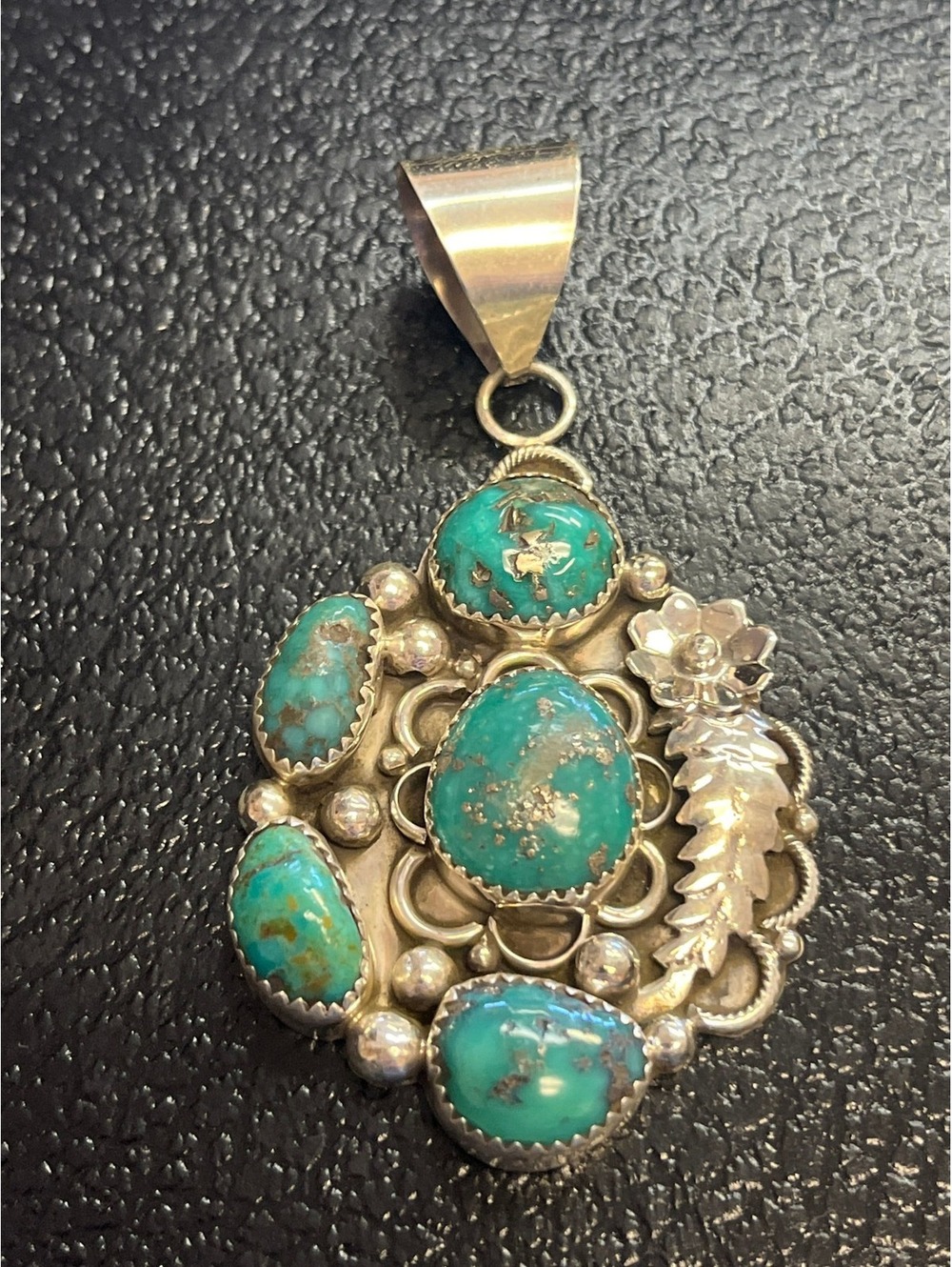Native American Navajo handmade sterling silver turquoise pendant